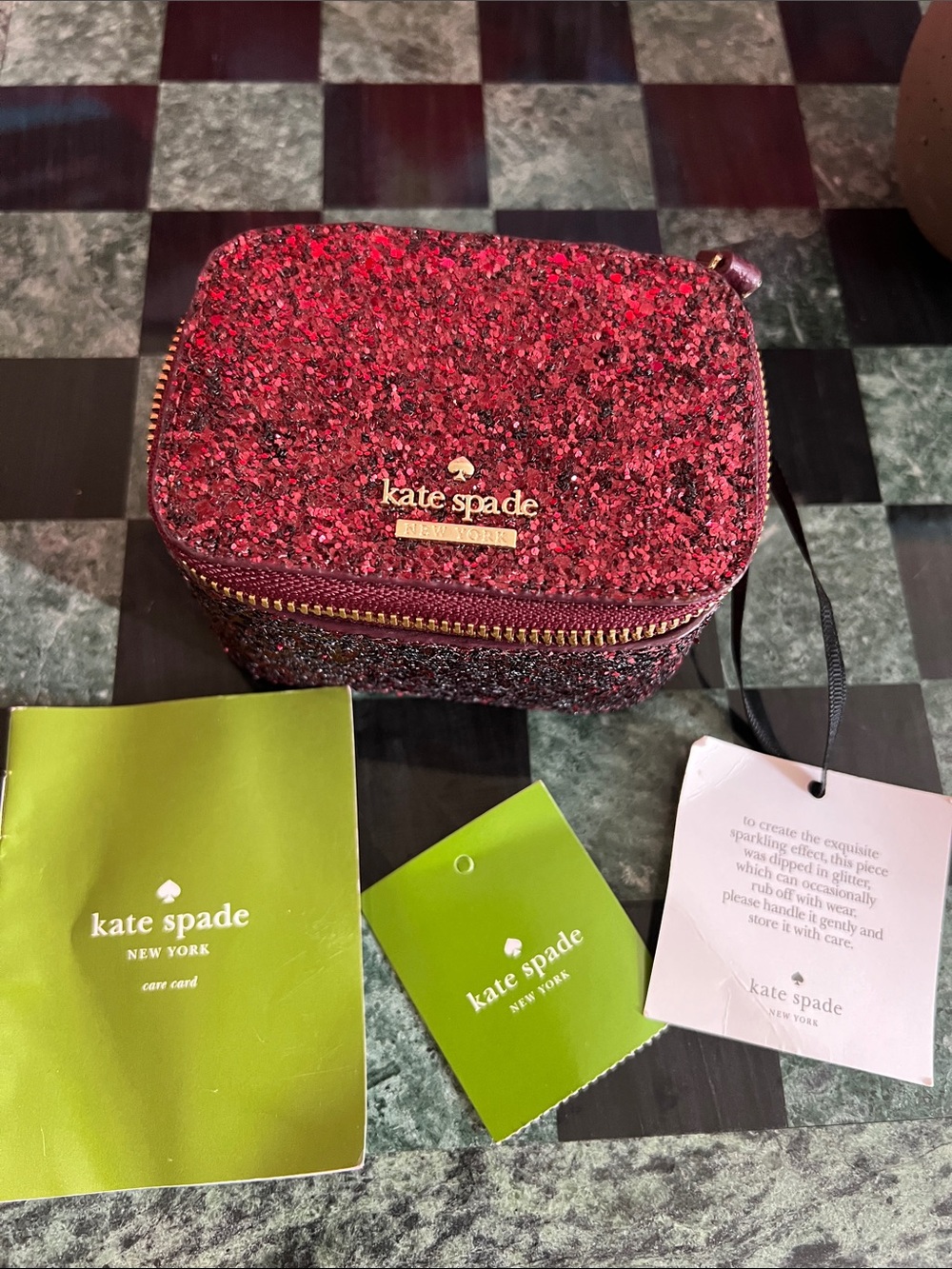 kate spade Red Glitter Zip jewelry Case with Gold Logo Plate